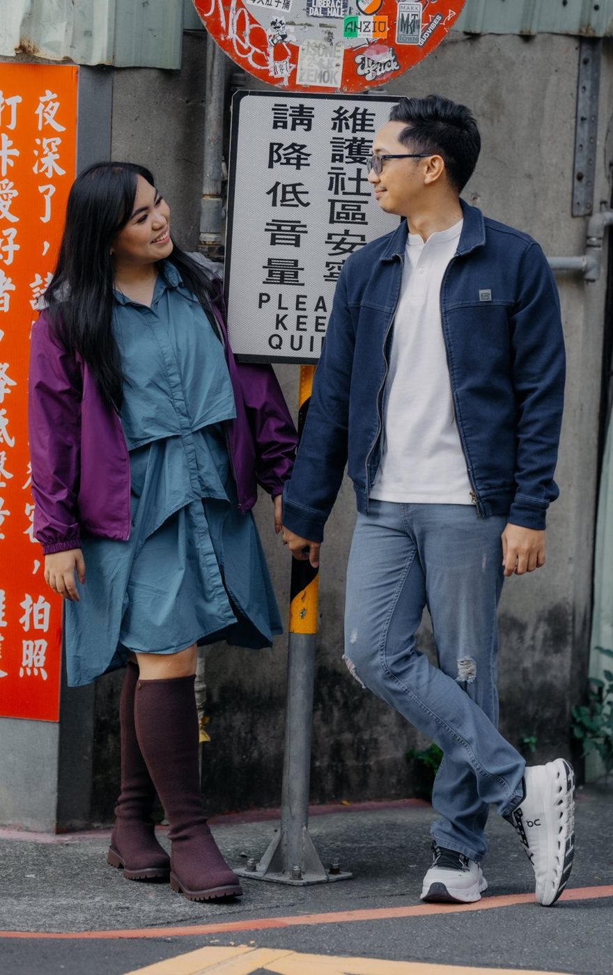 Rio and Jay by a street sign in Taipei